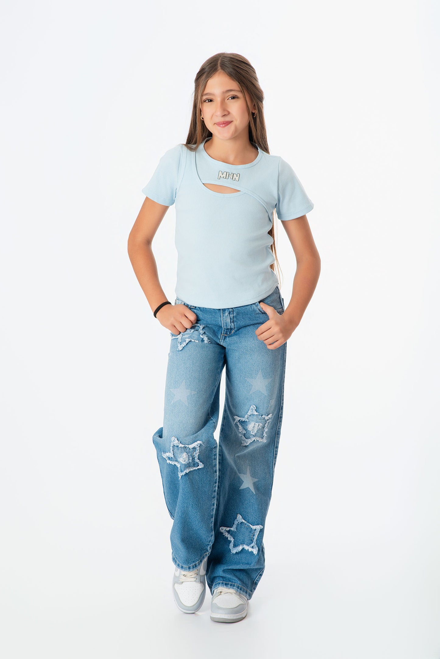 Conjunto jeans estrellas con blusa rib niña